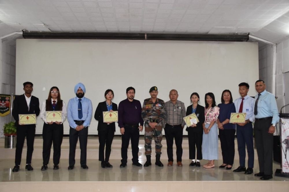 Officials with winners of the Inter College Debate Competition held at Assam Rifles Camp in Kohima on April 18.
