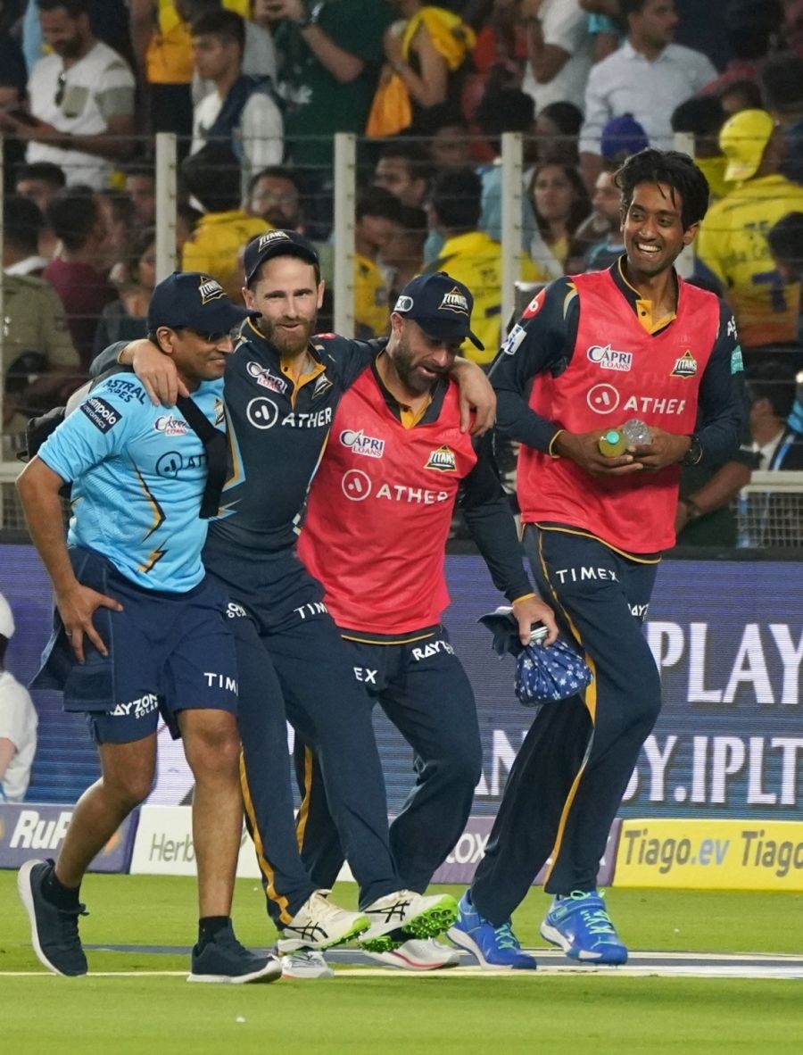 Ahmadabad : GT batter Kane Williamson leaves the ground after getting injured while fielding during the first match of  IPL 2023 between Gujarat Titans and Chennai Super Kings at Narendra Modi Stadium in Ahmedabad on Friday, March 31, 2023. (PHOTO: IANS/Siddharaj Solanki)
