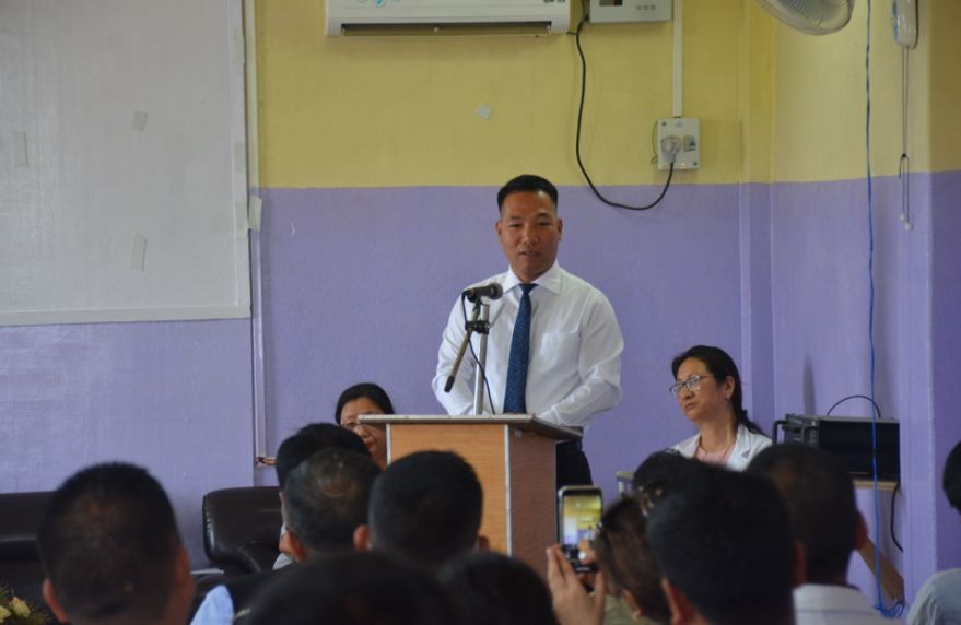 Minster P Paiwang speaking during his visit to District Hospital Mon on April 11. (DIPR Photo)
