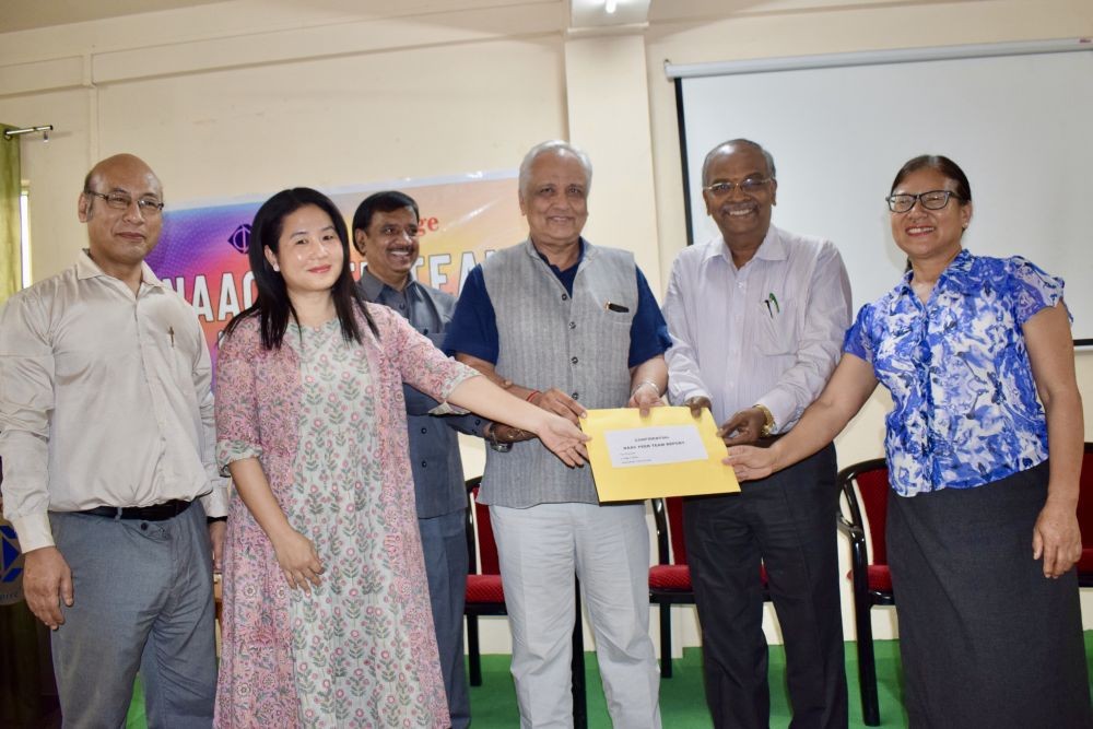 The NAAC Peer Team handing over the Confidential Peer Team Report to the Principal, C-Edge College in the presence of the Peer Team members, IQAC Coordinator, BoG Chairman.