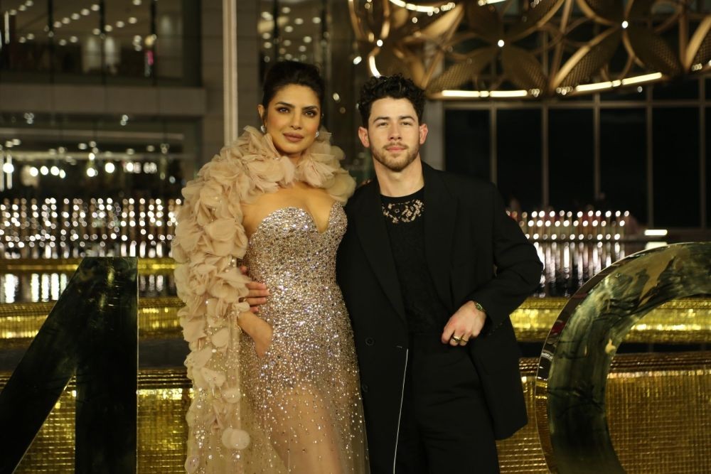 Mumbai: Actress Priyanka Chopra with her husband and American singer Nick Jonas pose for a photograph at the launch of Nita Mukesh Ambani Cultural Centre, in Mumbai on Friday, March 31, 2023. (Photo: Sanjay Tiwari/IANS)