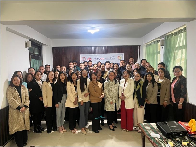 Participants posing for a photograph after the meeting.