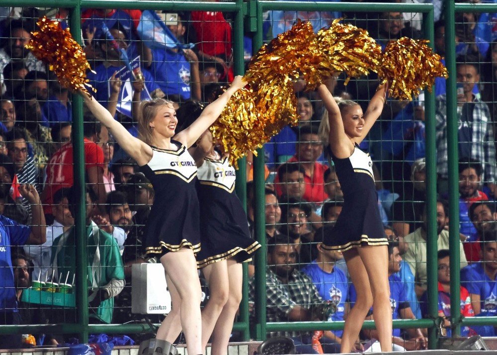 New Delhi: GT's cheerleaders cheer for their team during the IPL 2023 match between Delhi Capitals and Gujarat Titans at the Arun Jaitley stadium, on Tuesday, April 04, 2023. (Photo:Biplab Banerjee/IANS)