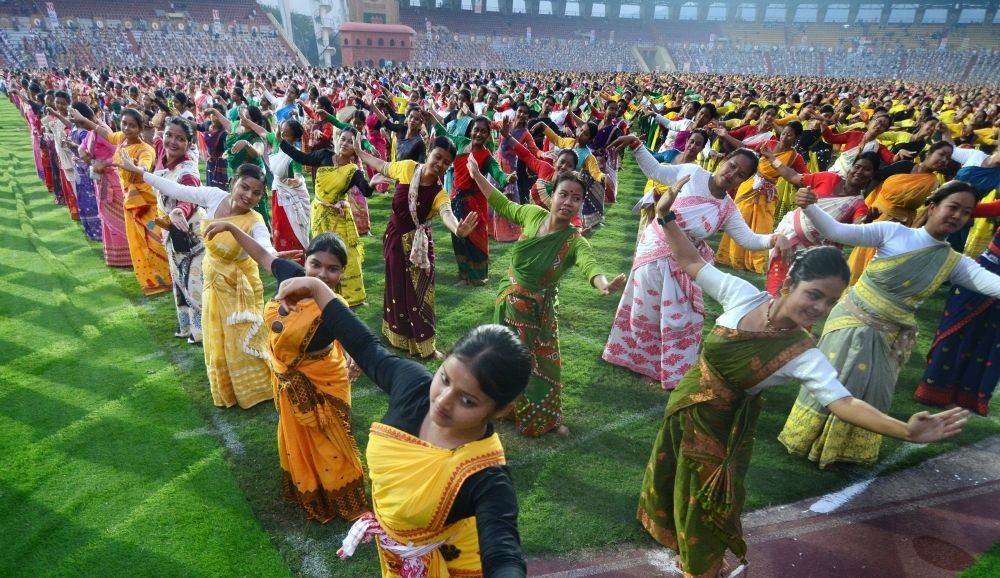 Traditional Bihu dancers of Assam performing  during the rehearsal for the Guinness Records at Sarusajai stadium in Guwahati.(Photo: Subhamoy Bhattacharjee) IANS