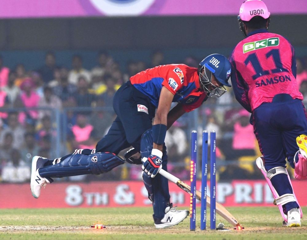 Guwahati : DC batsman Axar Patel stumped by RR's captain and wicket-keeper Sanju Samson during the IPL 2023 match between Delhi Capitals and Rajasthan Royals at Barsapara Stadium in Guwahati on Saturday, April 08, 2023. (Photo:IANS/Anuwar Hazarika)
