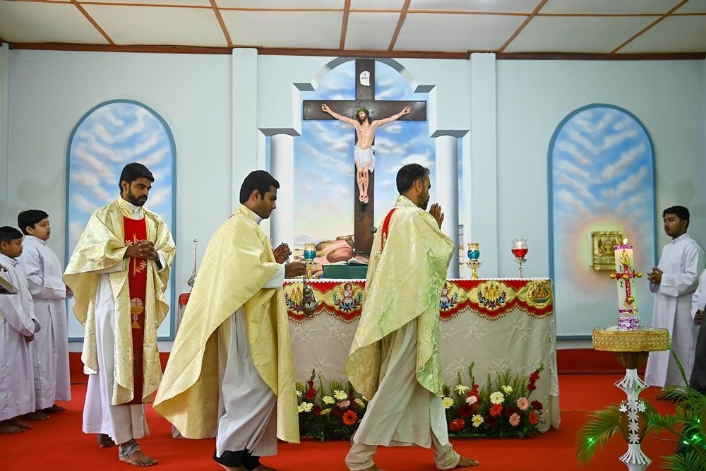 Agartala: Priests during Easter prayer on the occasion of Easter Sunday in Mariam Nagar church on the outskirts of Agartala on Sunday, April 09, 2023. (Photo:Abhisek Saha/IANS)