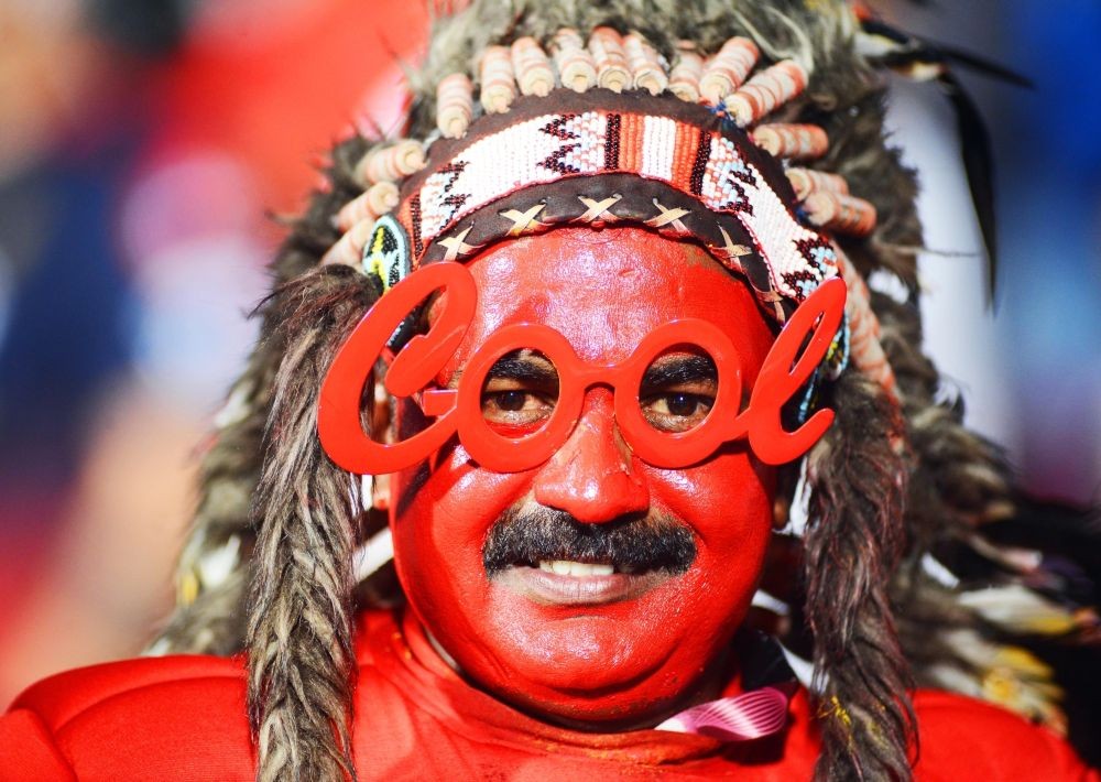 Bengaluru : A fan paints himself in the colours of RCB to show his support for the team during the IPL 2023 match between Royal Challengers Bangalore and Mumbai Indians, at Chinnaswamy Stadium in Bengaluru on Sunday, April 02, 2023. (Photo:IANS)
