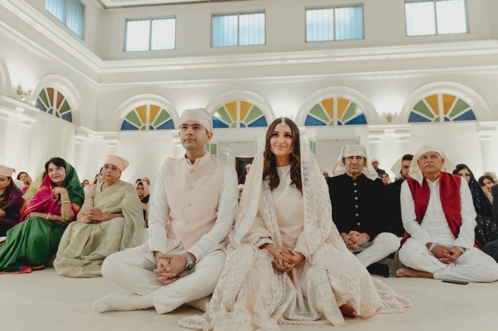 New Delhi: AAP leader Raghav Chadha and his fiance and Bollywood actor Parineeti Chopra seek blessings of the Jathedar of the Akal Takht Sahib, Singh Sahib Giani Harpreet Singh Ji.  (Photo:IANS)