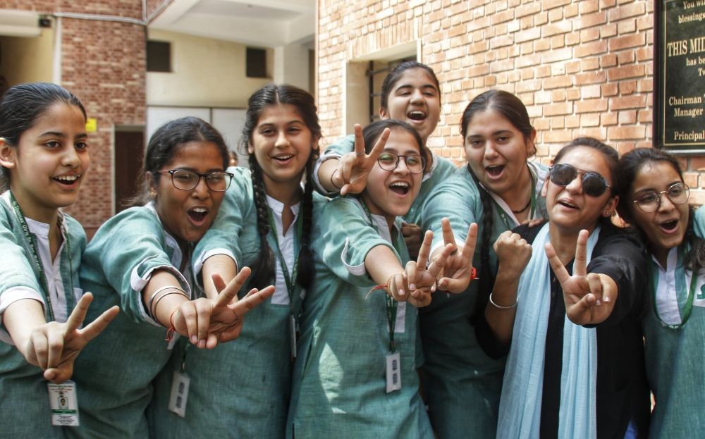 New Delhi: Students jubilate after the announcement of Central Board of Secondary Education (CBSE) Class 10th exam results at St. Thomas School in New Delhi on Friday, May 12, 2023. (Photo: IANS/Wasim Sarvar)