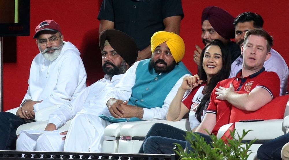 Dharamshala: Punjab Chief Minister Bhagwant Mann with PKBS' owner Preity Zinta and her husband Gene Goodenough watch the IPL 2023 match between Punjab Kings and Rajasthan Royals, at HPCA Stadium, in Dharamshala, on Friday, May 19, 2023. (Photo:Raj Kumar/IANS)