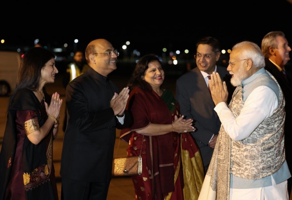 Sydney: Prime Minister Narendra Modi being received upon his arrival, in Sydney, on Monday, May 22, 2023, after his visit to Papua New Guinea and Hiroshima.  (Photo:IANS/Twitter)