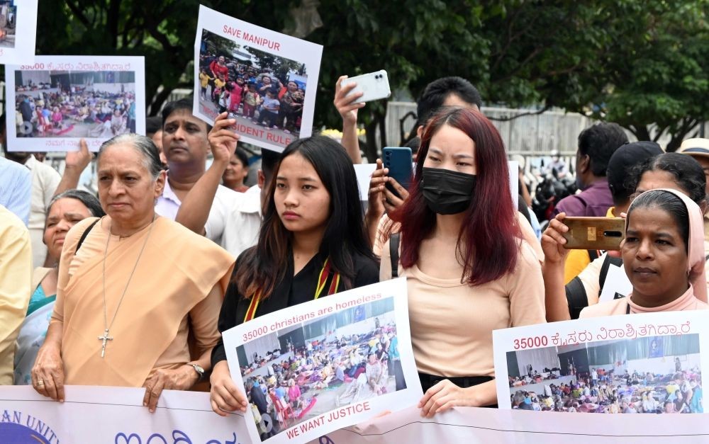 Bengaluru: Members of Indian Christian Unity Forum stage a protest against alleged atrocities on Christians in Manipur, at Freedom Park in Bengaluru, on Tuesday, May 30, 2023. (Photo:IANS)