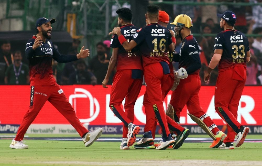 Jaipur : Royal Challengers Bangalore players celebrate after winning the IPL 2023 match against Rajasthan Royals at Sawai Mansingh Stadium in Jaipur on Sunday, May 14, 2023. (Photo:Biplab Banerjee/IANS)