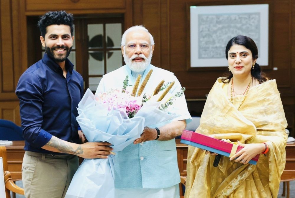 New Delhi: Prime Minister Narendra Modi meets Indian cricketer Ravindra Jadeja and his wife Rivaba Jadeja,in New Delhi,Tuesday, May 16, 2023. (Photo:IANS/Twitter)