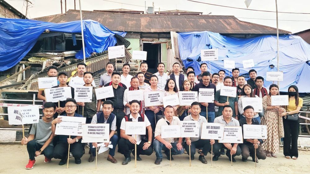 NSF officials and others displaying placards in protest against the demolishing of their office at Naga Club on May 30 in Kohima. (Morung Photo)