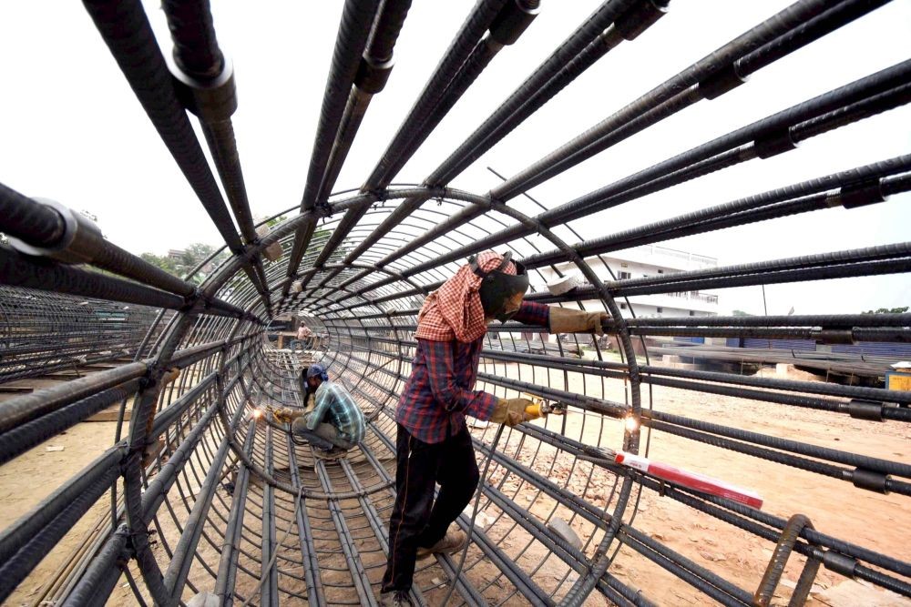 Patna: Labourers work at a construction site on the occasion of Labour Day, in Patna, on Monday, May 1, 2023.(Photo: IANS)
