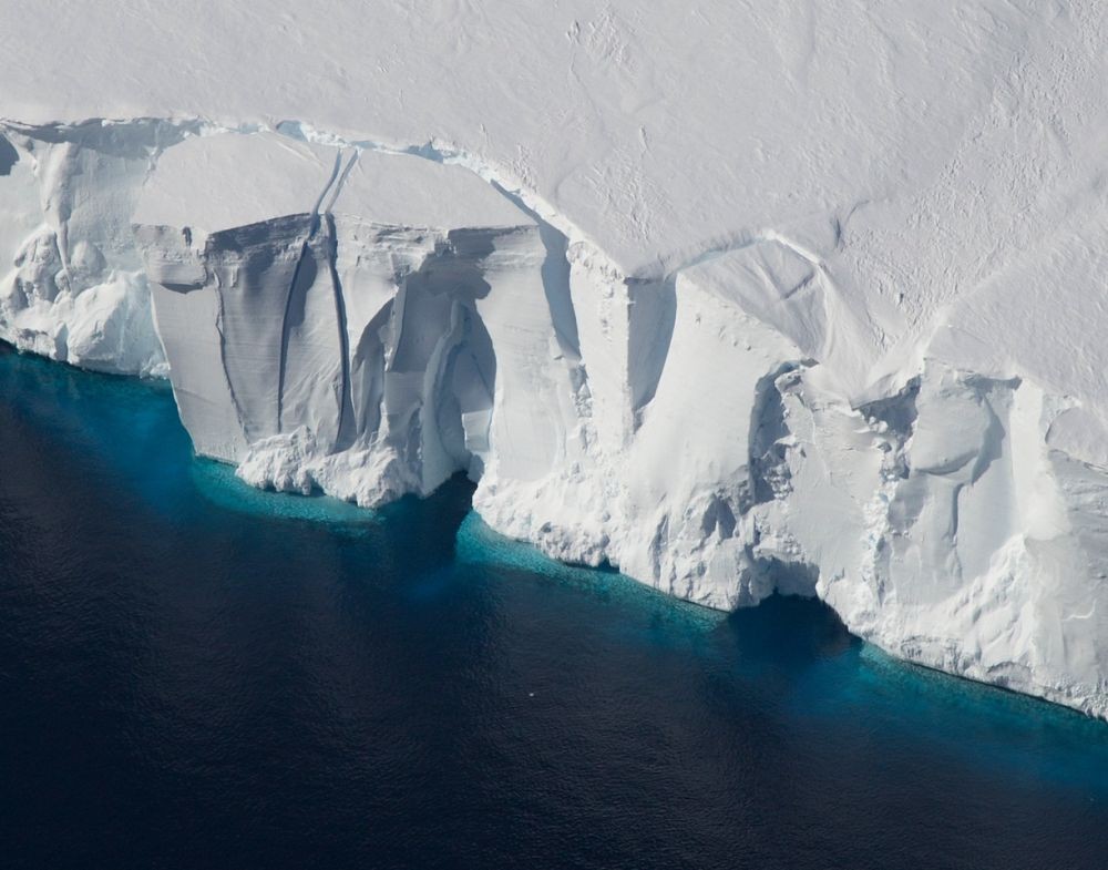 Ice shelves in Antarctica, such as the Getz Ice Shelf seen here, are sensitive to warming ocean temperatures. Ocean and atmospheric conditions are some of the drivers of ice sheet loss that scientists considered in a new study estimating additional global sea level rise by 2100. (Photo Courtesy: Jeremy Harbeck/NASA)