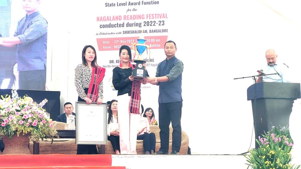 GPS Orchid receives award from Nagaland’s school education & SCERT advisor Dr. Kekhrielhoulie Yhome during state level award function for the Nagaland Reading Festival in Kohima on May 12. (Morung Photo)