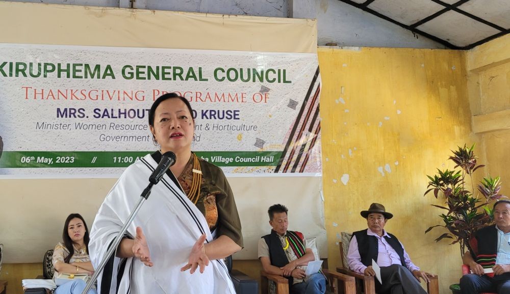 Minister Salhoutuonuo Kruse addressing the programme held at Peducha Village Council Hall on April 6. (Morung Photo)
