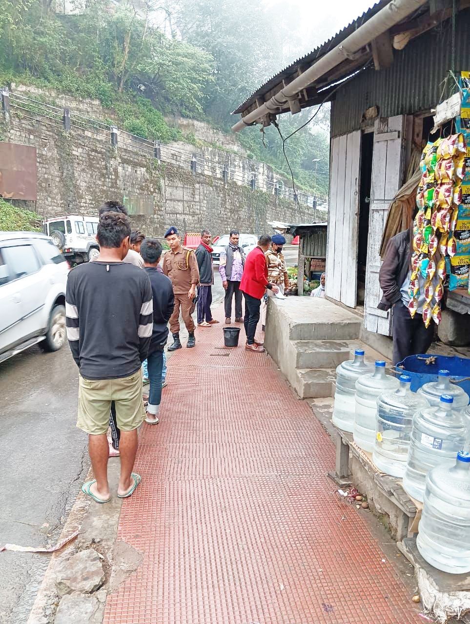 Kohima district administration and police carrying out verification drive on ILP in Kohima town on May 16. (DIPR Photo)