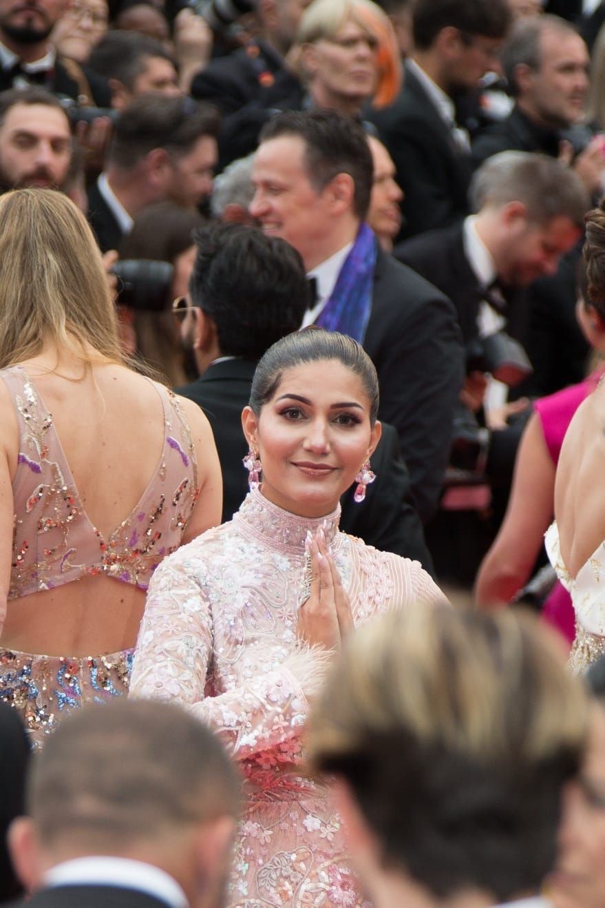 Sapna Choudhary fulfils 'lifetime dream' in crepe coloured gown at Cannes