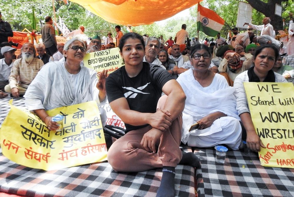 New Delhi: Wrestler Sakshi Malik with supporters during the wrestlers' protest at Jantar Mantar in New Delhi on Saturday, May 20, 2023. (Photo: Anupam Gautam/ IANS)