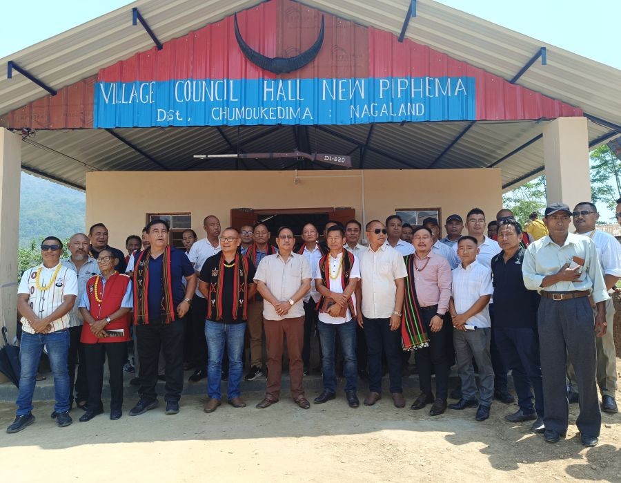 Village leaders and invitees with Zhaleo Rio, Advisor, Urban Development & Municipal Affairs after inaugurating the Village Community Hall at New Piphema on May 11.