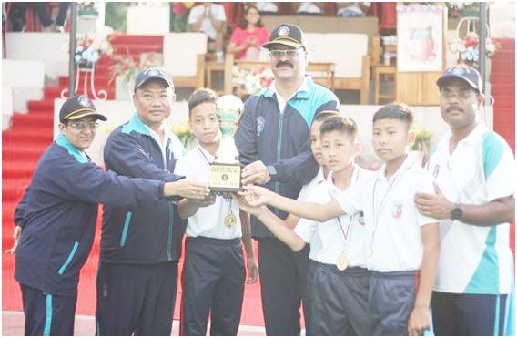 SS Punglwa Sub-Junior receiving trophy.