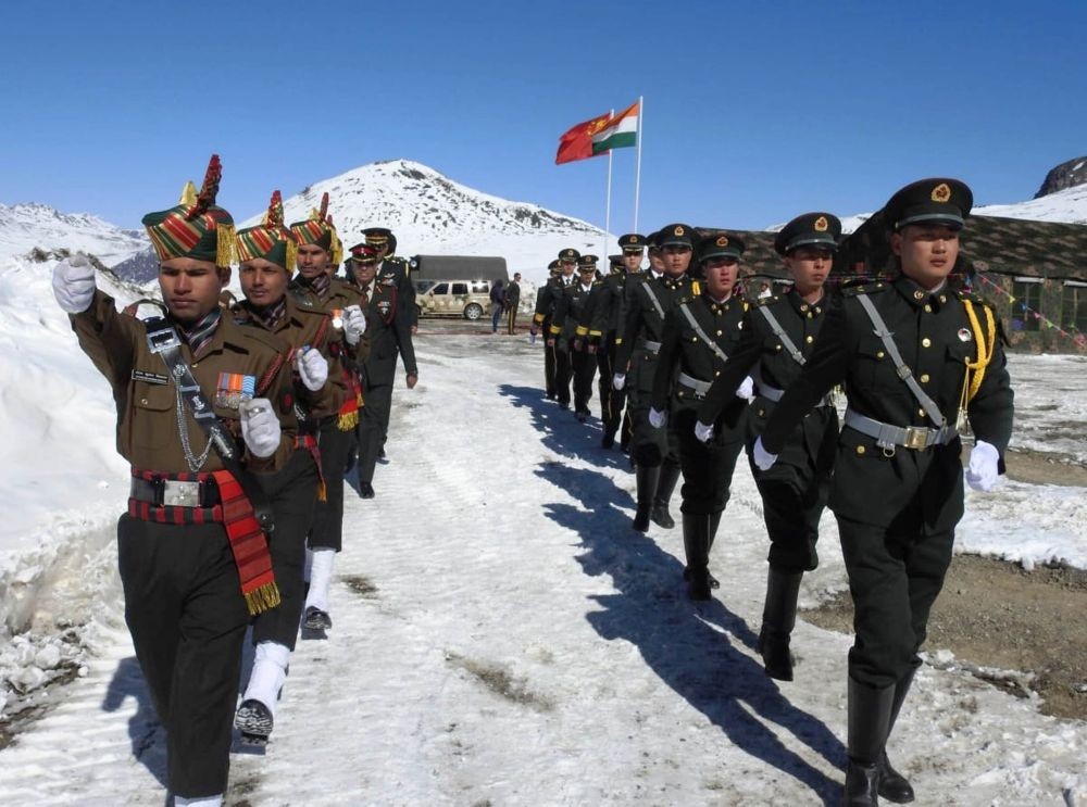 Bumla: Indian and Chinese soldiers jointly celebrate New Year in Bumla along the Indo-China border in Arunachal Pradesh's Tawang district on Jan 1, 2019. (Photo: IANS)