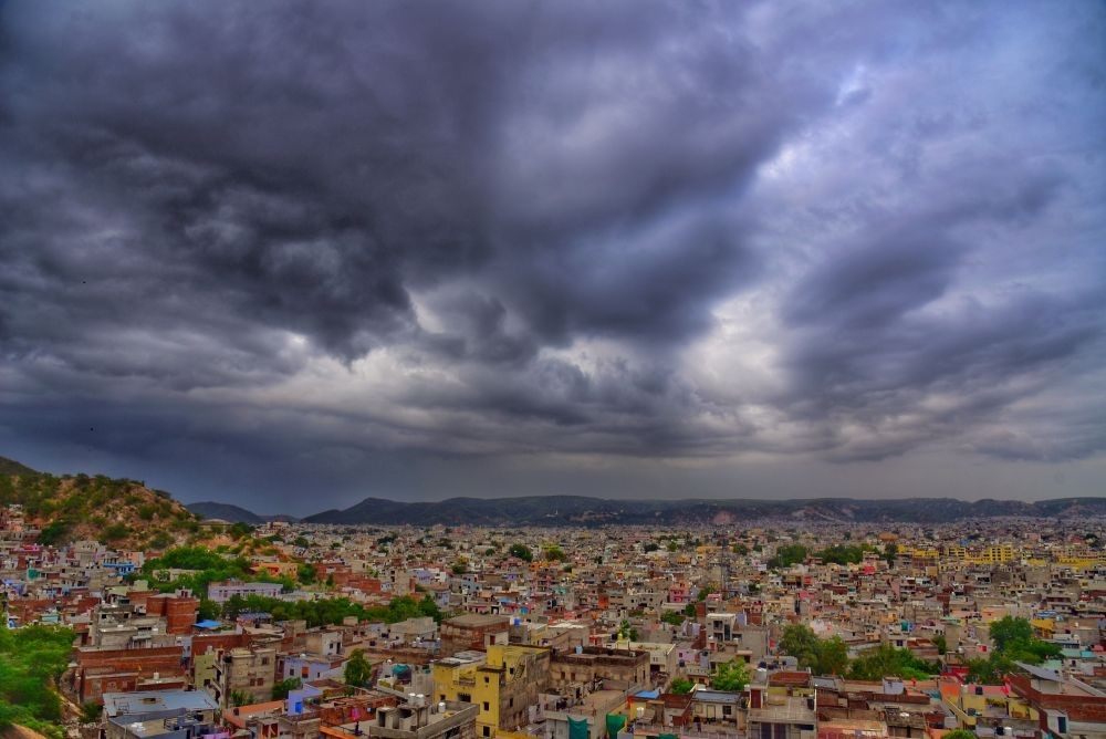 Jaipur: A captivating view from Nagar Fort captures the site of dark clouds hovering in the sky above Jaipur on Saturday, June 17, 2023. (Photo:Ravi shankar vyas/IANS)