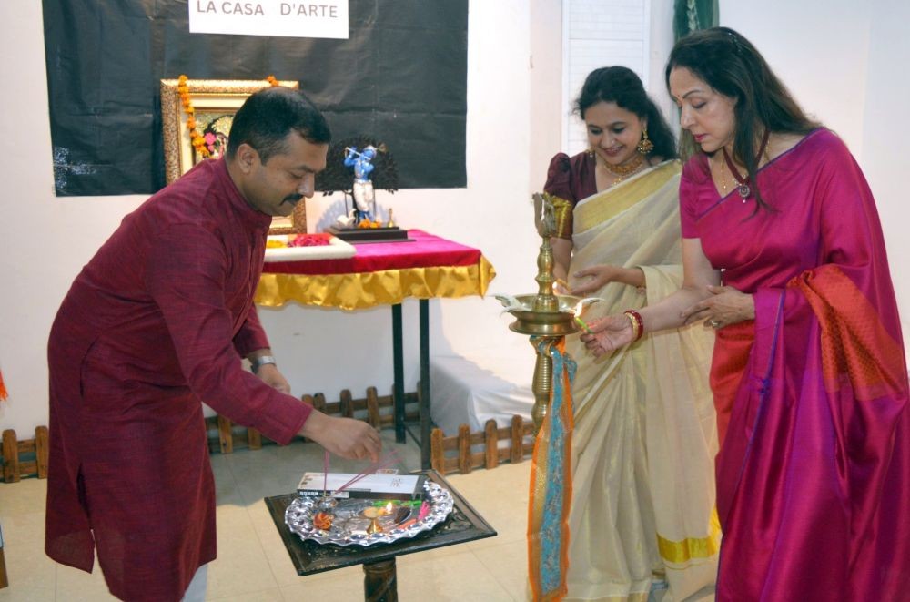 Mathura : BJP MP and Bollywood Actress Hemamalini lights a lamp during an art house exhibition, in Mathura, Friday, June 23, 2023. (Photo: Yuvnish /IANS)