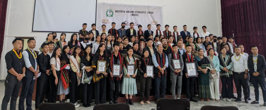 Dignitaries with the successful students and other participants of the programme.