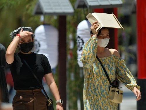China renews orange alert for high temperatures amid heat waves