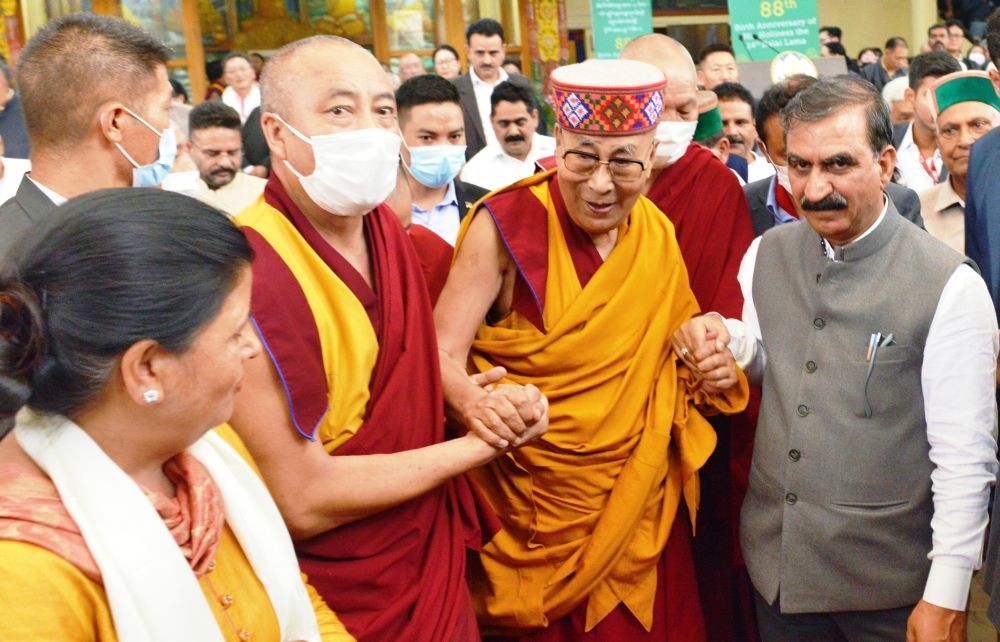 Dharamsala: Himachal Pradesh CM Sukhvinder Singh Sukhu greets Tibetan spiritual leader Dalai Lama on the occasion of his 88th birthday at the Tsuglagkhang complex, in Dharamsala, on Thursday, July 06, 2023. (Photo: IANS)