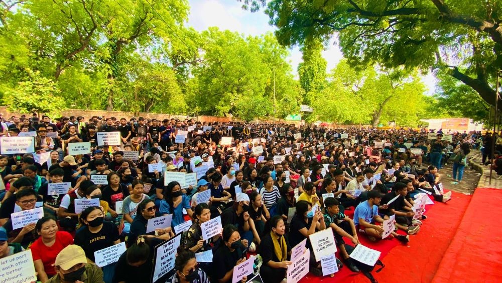 People from Kuki-zo tribal community stage a protest at Jantar Mantar in New Delhi on  July 22. (IANS Photo)