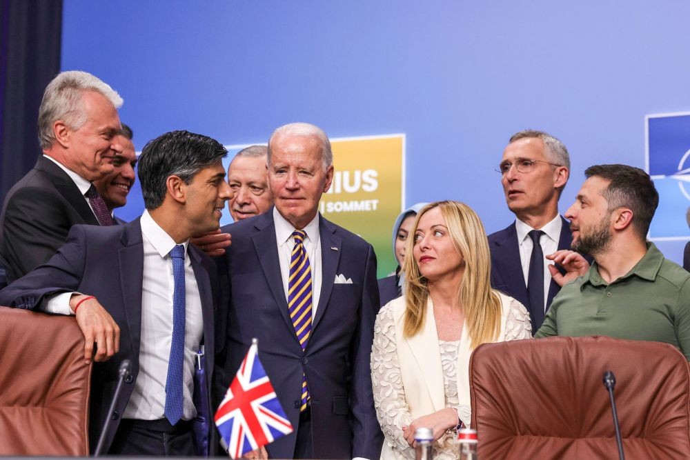 Vilnius : From (L-R) Lithuania's President Gitanas Nauseda, British Prime Minister Rishi Sunak, Turkish President Recep Tayyip Erdogan, U.S. President Joe Biden, Prime Minister of Italy Giorgia Meloni, NATO Secretary General Jens Stoltenberg and Ukrainian President Volodymyr Zelensky during the second day of the NATO Summit meeting in Vilnius, Lithuania on Wednesday, July 12, 2023. (Photo:IANS/Twitter:@RishiSunak)