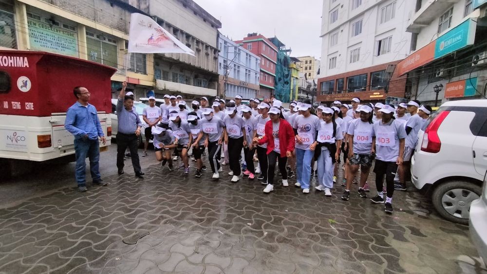 ADC Kohima, Rhosietho Nguori flagging off the Youth Fest-Marathon Race in Kohima on August 12.