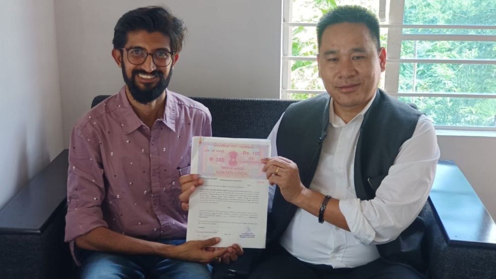 MLA Ar.Jwenga Seb with Rituraj during the signing of MoU between DPDB Tseminyu and Zetta Farms on August 19 at Tseminyu.