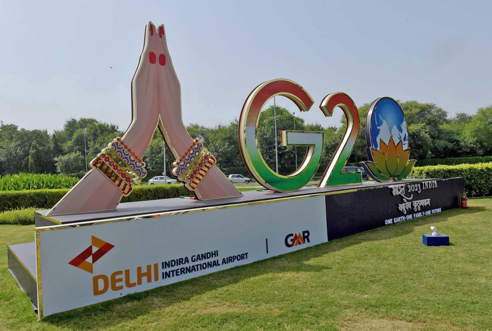New Delhi: The redeveloped and illuminated G20 logos installed at the nearest prominent footpath and road roundabout of Indira Gandhi International Airport on the occasion of the G20 Summit preparations, in New Delhi on Sunday, August 27, 2023. (Photo: IANS/PIB)
