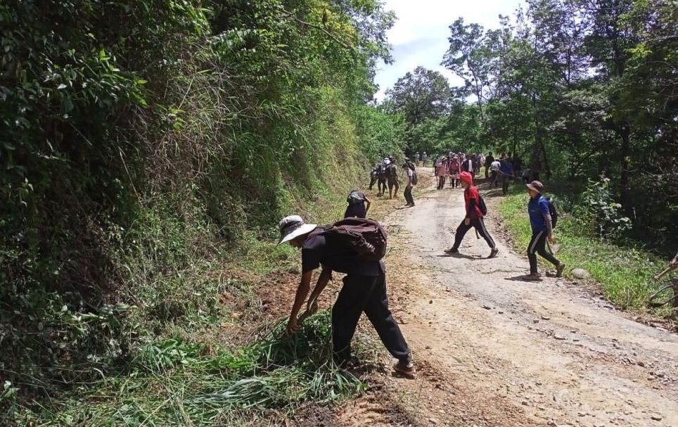 Villagers repairing the PWD road on August 13.