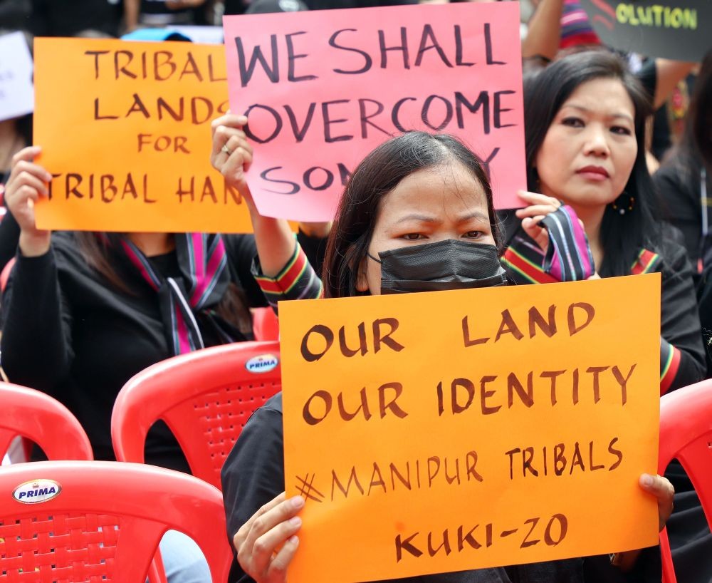 Bengaluru : Members of Unau Tribal community stage a demonstration in support of Kuki-Zo tribal of Manipur, in Bengaluru on Tuesday, August 01, 2023. (Photo:IANS)