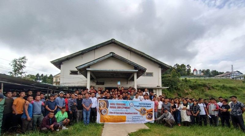 Dignitaries with trainees of the skill training for rural employment at Peren.