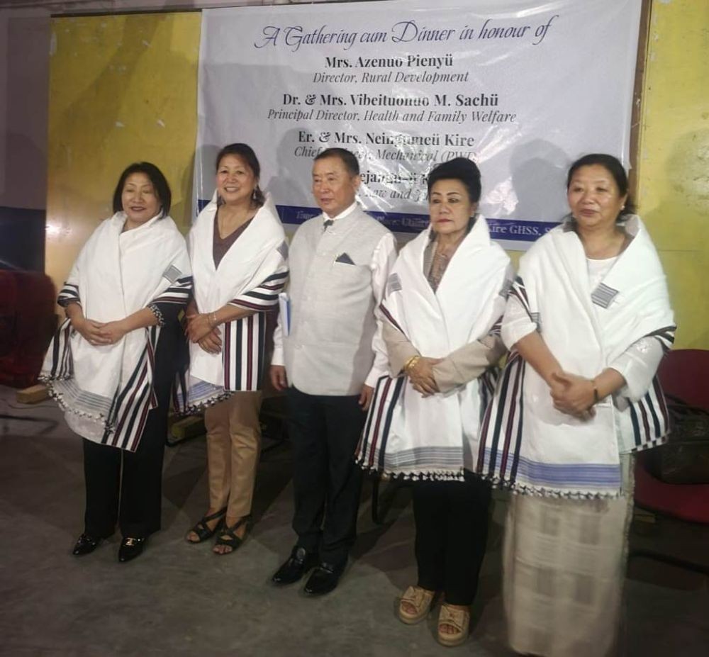 Pele Khezhie with officers during the felicitation programme at Kohima village.