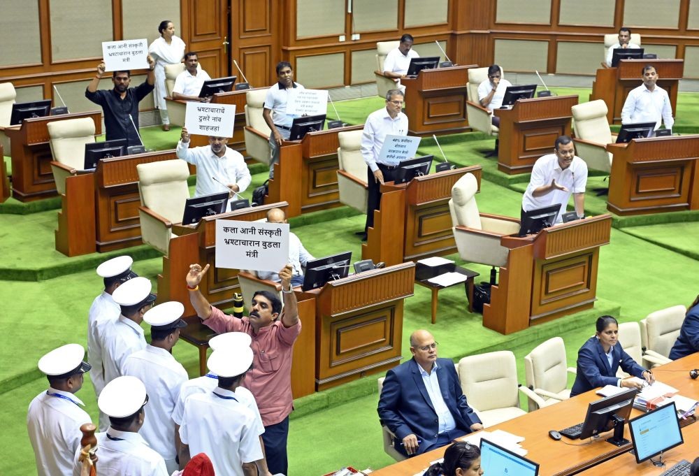 Porvorim : Opposition MLAs enter the well of the House and create a ruckus over the collapse of a portion of the Kala Academy structure on the first day of the Goa Assembly Monsoon Session in Porvorim on Tuesday, July 18, 2023. (Photo: IANS/Atish Naik)