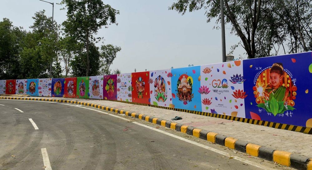 New Delhi: The redeveloped and illuminated G20 logos installed at the nearest prominent footpath and road roundabout of Indira Gandhi International Airport on the occasion of the G20 Summit preparations, in New Delhi on Sunday, August 27, 2023. (Photo: IANS/PIB)
