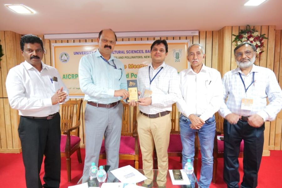 Dr Avinash Chauhan, Principal Investigator, All India Coordinated Research Project on Honey bees & Pollinators receiving the awards from Project Coordinator, ICAR, during the annual workshop and group meeting from September at the University of Agricultural Sciences, Bengaluru.