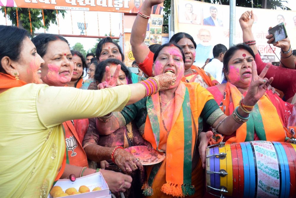 Patna: BJP Mahila Morcha workers celebrate after the introduction of Women's Reservation Bill in Lok Sabha, in Patna, Tuesday, September 19, 2023.(IANS)