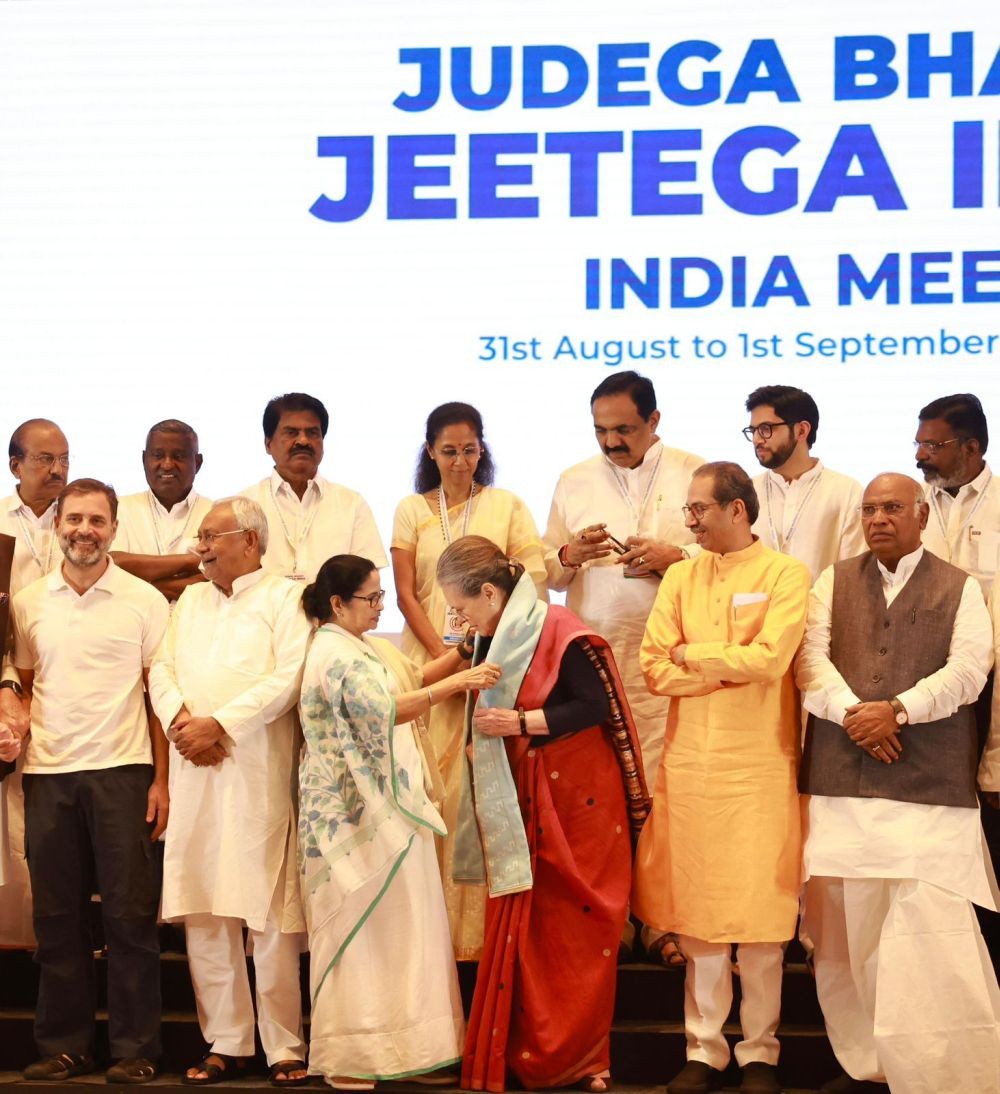 Mumbai: West Bengal Chief Minister Mamata Banerjee presents a shawl to Congress senior leader Sonia Gandhi during the group photograph session at the Indian National Developmental Inclusive Alliance (I.N.D.I.A) meeting in Mumbai on Friday, September 01, 2023. (Photo: IANS)