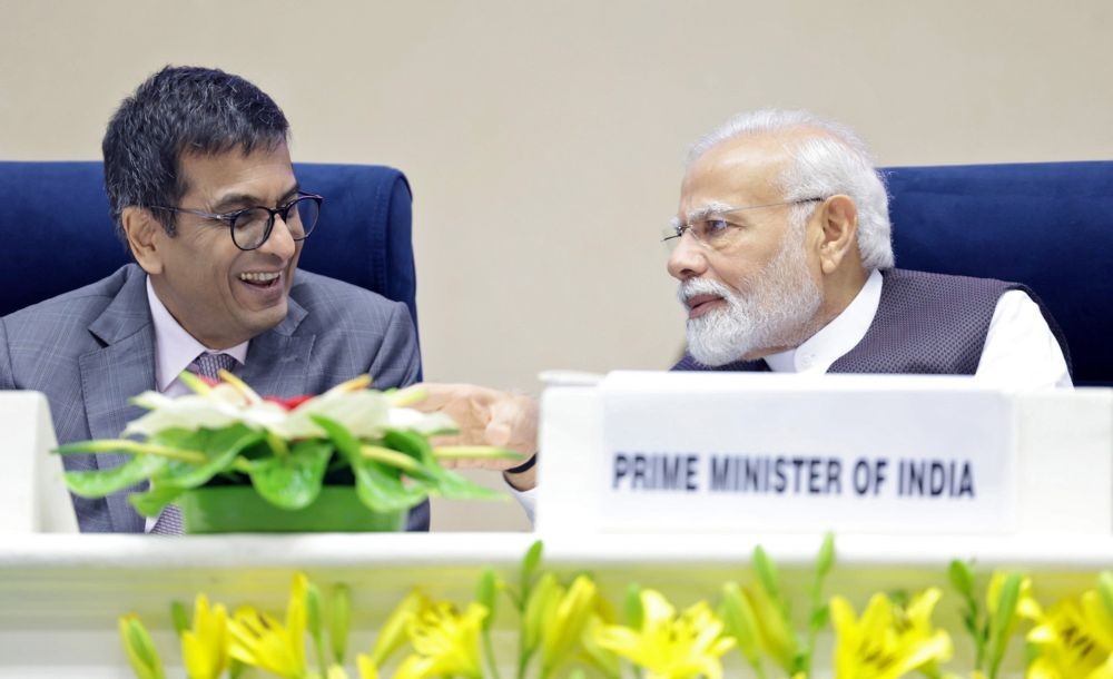 New Delhi : Prime Minister Narendra Modi and Chief Justice of India Dhananjaya Yeshwant Chandrachud during the BAR Council of India International Lawyers' conference 2023 at Vigyan Bhawan, in New Delhi on Saturday, September 23, 2023. (Photo: IANS/PIB)
