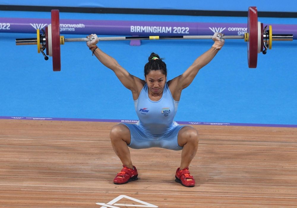 Birmingham: India's Chanu Saikhom Mirabai in action during the Women's 49kg weightlifting event at The NEC on day two of the Commonwealth Games in Birmingham, England, Saturday July 30, 2022(Photo: Subir Halder/IANS)